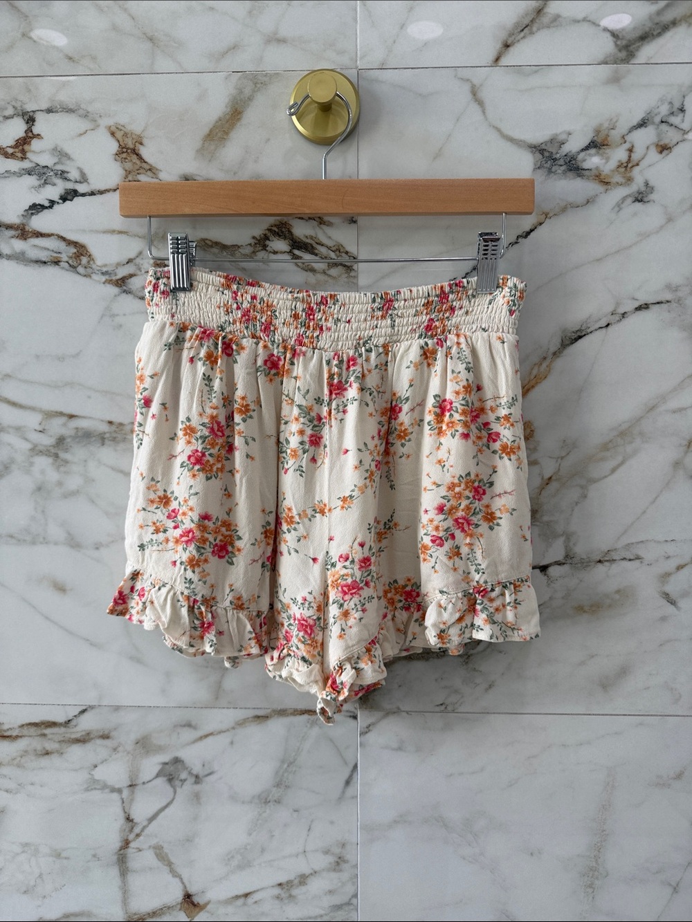 High-Waist Floral Ruffle Shorts in Cream with Pink & Orange Print